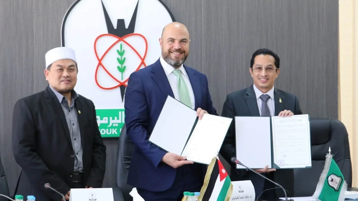 جامعة اليرموك والكلية الإسلامية الماليزية تبحثان التعاون الأكاديمي